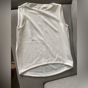White sleeveless top